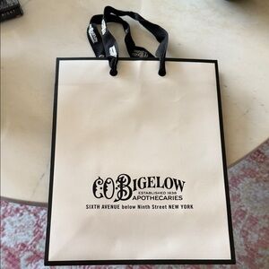 C.O. Bigelow White & Black Logo Gift Bag - Women Bags
